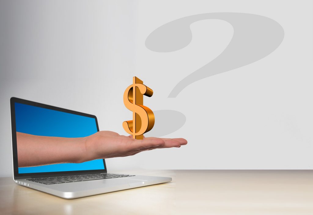 cost_to_build_app A laptop and a hand showing a dollar sign determining the cost to build an app.